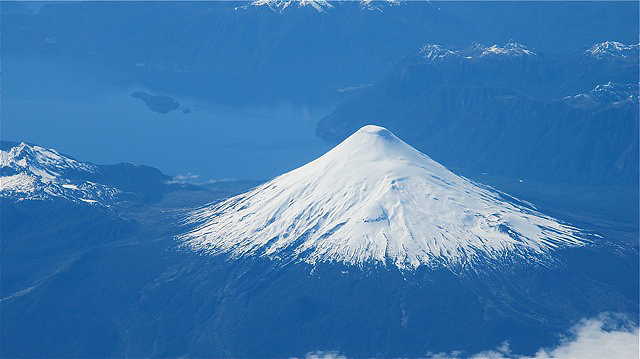 Volcano peak near Valdivia, Chile, as seen from the IceBridge DC-8. Credit: NASA / Jim Yungel.